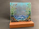 Seascape and flowers 14cm base by 14cm high