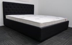 Queen black upholstered bed &. Pocket spring mattress