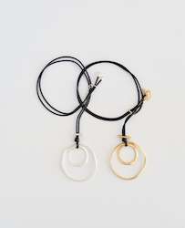 Accessories: Double hoop with disc necklace