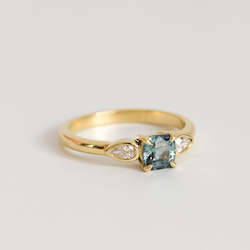 Teal Cushion Cut Sapphire with Pear Diamonds in 18ct Yellow Gold