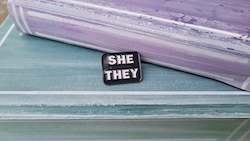 Books: Pin: She/They