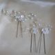 Pearlescent white and glass bead pearl centered flowers set of three hair pins