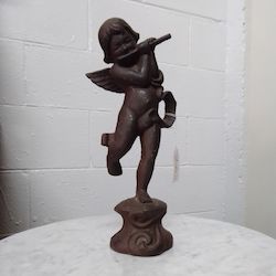 Antique Cast Iron Cupid