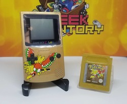 Toy: custom gold Gameboy with game