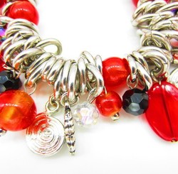 Jewellery: Red and silver charm chain bracelet