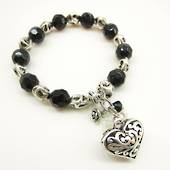 Black and clear bead with koru heart bracelet