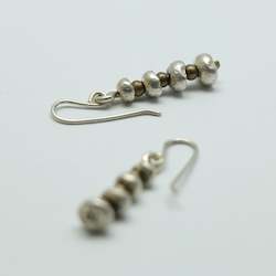 Jewellery: Pirepire silver/brass earrings