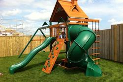 The morepork - tube slide with wave slide and swings - kiwiplay