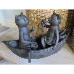 Cats Picnicking on a Boat