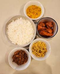 Takeaway food: Rice and curry (Steamed white rice, three variety of curries and Choice of your meat