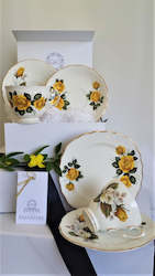 Royal Vale & Royal Sutherland Cup, Saucer & Side Plate with assorted teaspoons & cake forks