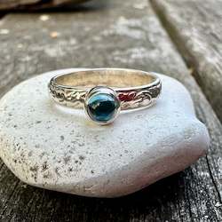 Tiny blue topaz ring