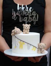 Craft material and supply: We're having a baby! cake topper