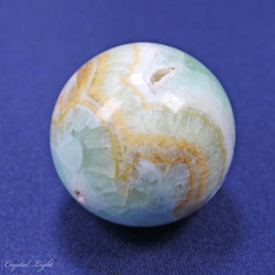 China, glassware and earthenware wholesaling: Pistachio calcite Sphere 50mm