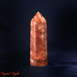 China, glassware and earthenware wholesaling: Orange Orchid Calcite Point