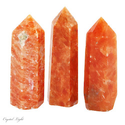 China, glassware and earthenware wholesaling: Orange Orchid Calcite Polished Point