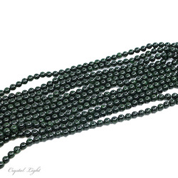 China, glassware and earthenware wholesaling: Green Goldstone 8mm Round Bead