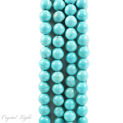China, glassware and earthenware wholesaling: Light Blue Howlite 8mm Beads